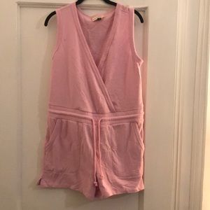 Cute pink Jersey romper never worn tags on.